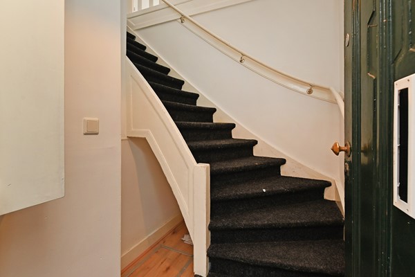 Medium property photo - Deimanstraat 309, 2522 BK Den Haag